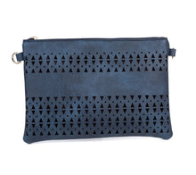 Load image into Gallery viewer, Navy crossbody bag with geometric cut-out design on a white background IVYS